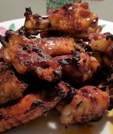 A plate of Asian Ginger Sticky Chicken Wings