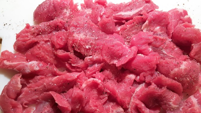 Slice the beef into strips