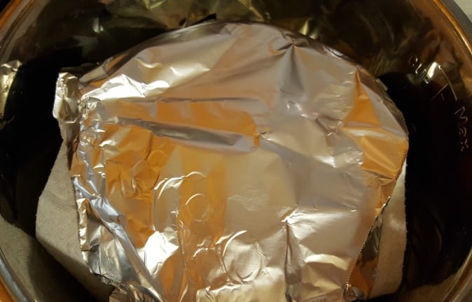 Cover Cheesecake with Towel and Tent with Foil