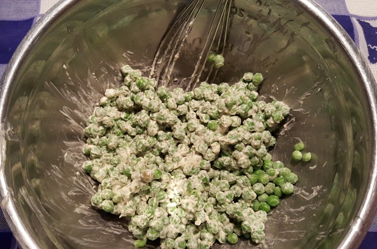 Whisk the dressing into the Peas