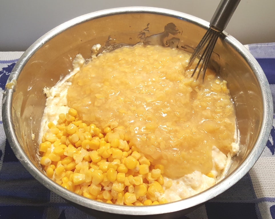Pour in both cans of Corn