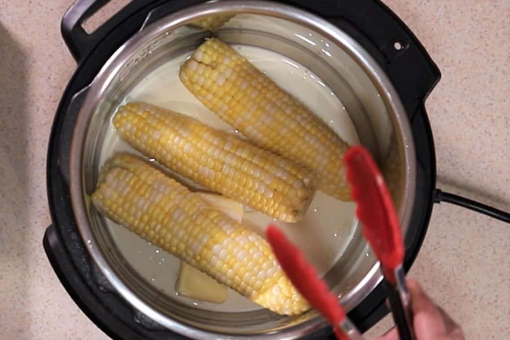 Corn is Added to the Liquid in Cooking Pot