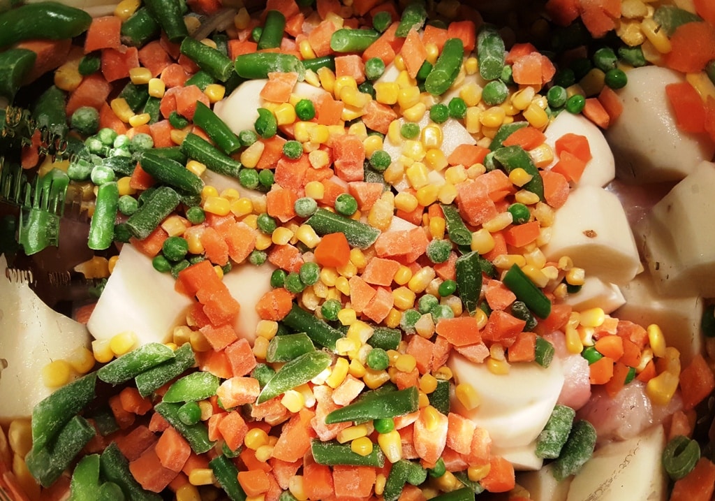 Add Carrots, Corn, Peas, Green Beans and Potatoes into Cooking Pot