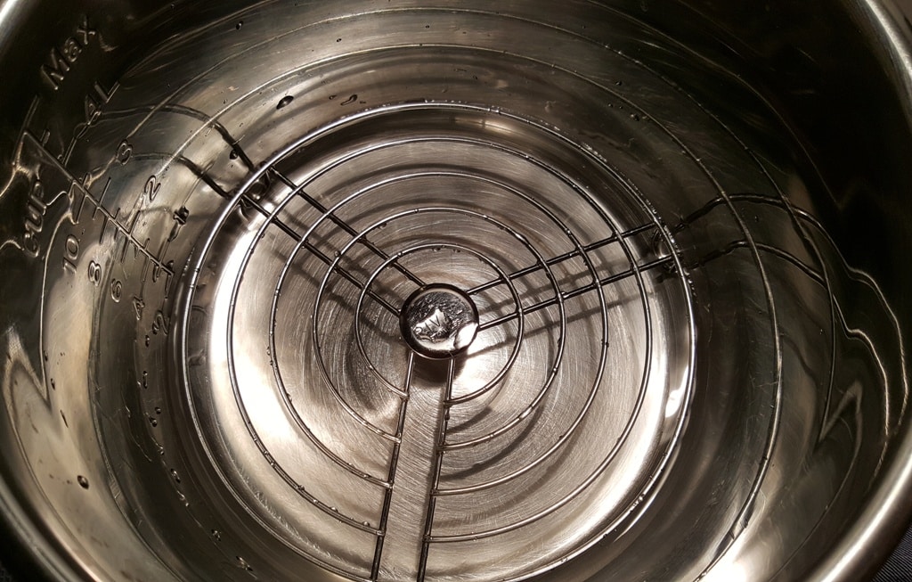 Place water and trivet into Pressure Cooker
