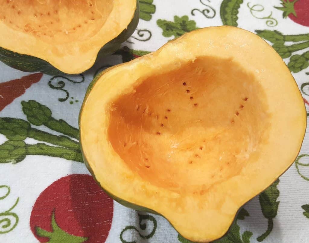 Poke the Acorn Squash in the inside with a Fork
