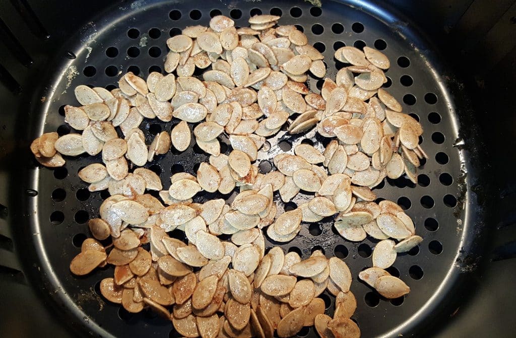 Place Cinnamon Sugar Pumpkin Seeds in Air Fryer