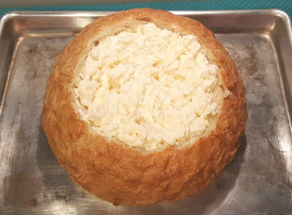 Pour the Onion Cheese mixture into the Bread Bowl
