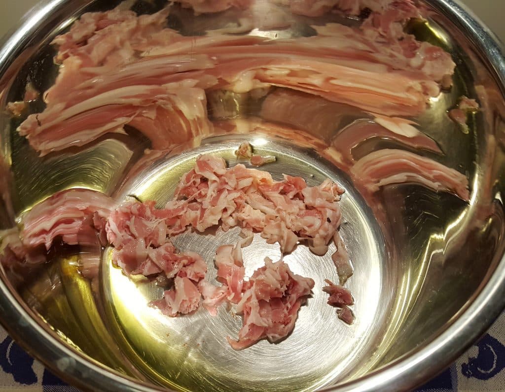 Add the Pancetta to a Pressure Cooker Cooking Pot