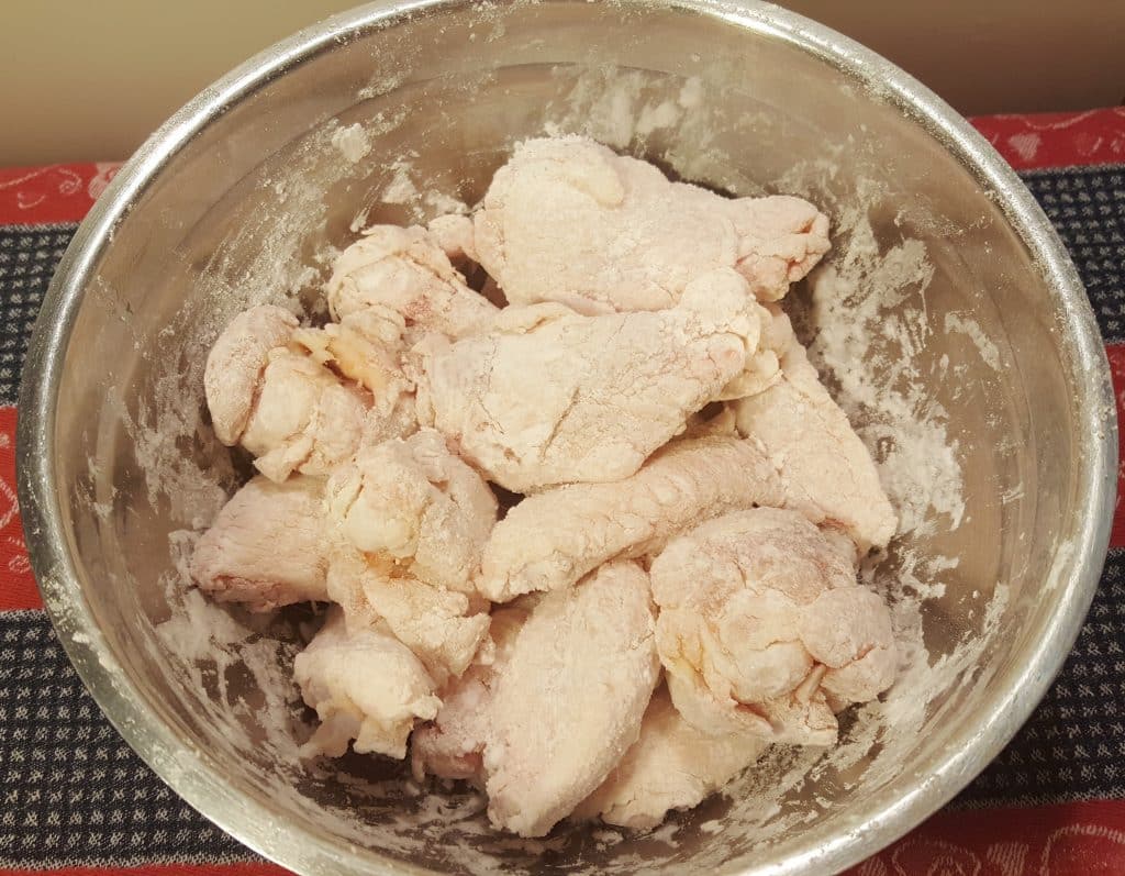 Coat Wings with Potato Starch and Seasoning Mix