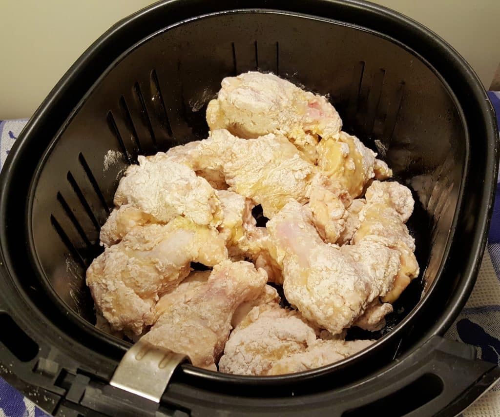 Place Chicken Wings into Air Fryer Basket