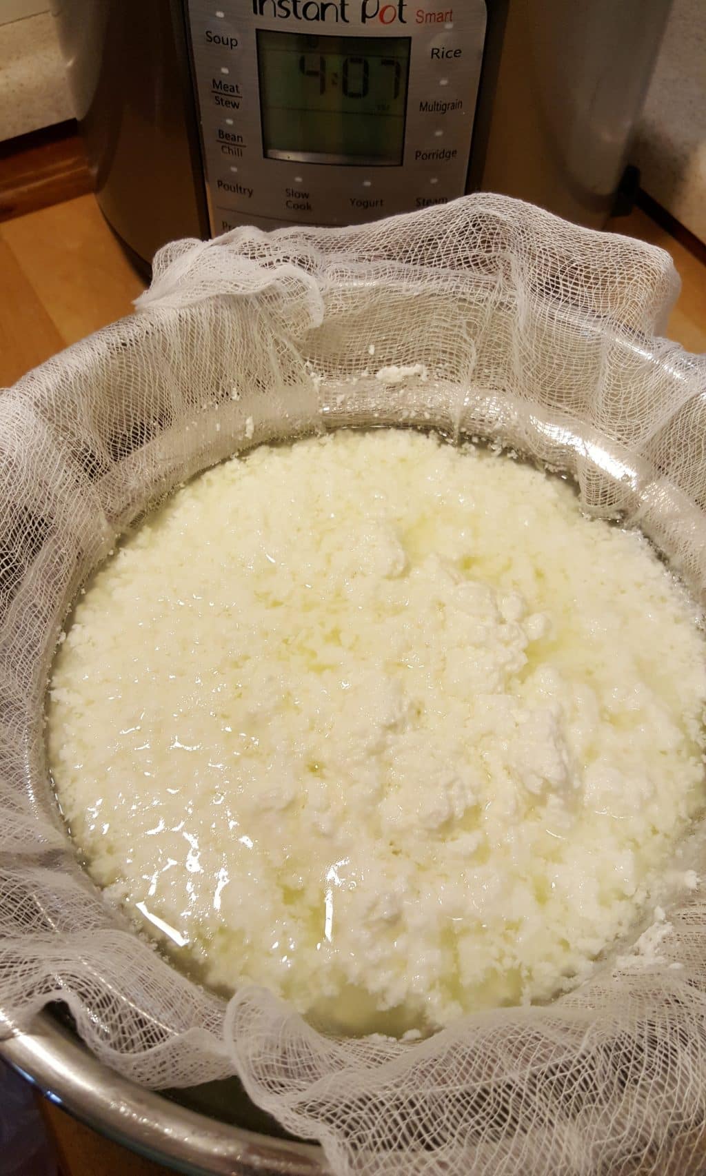 Pour the Cottage Cheese into Strainer Basket