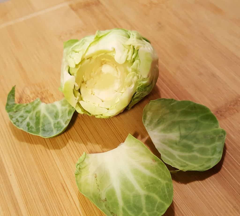 Core the Brussels Sprouts and Remove Leaves