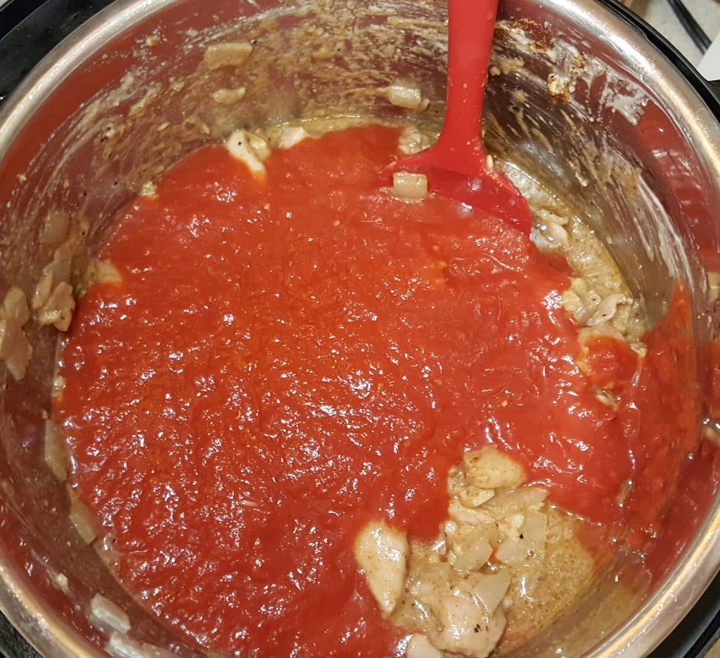 Mix in the Crushed Tomatoes