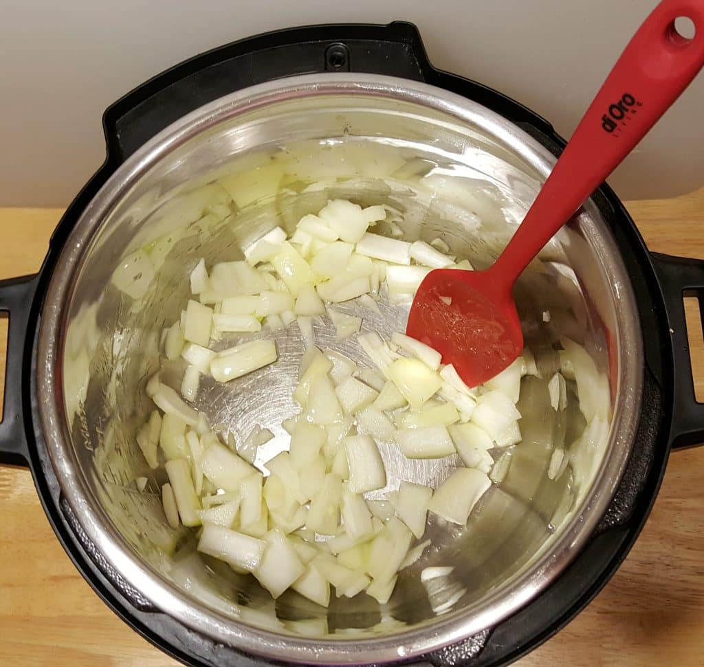Heat Pressure Cooker, Add Oil and Onions
