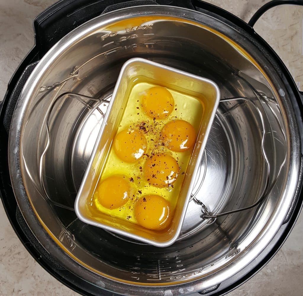 Place Loaf Pan of Eggs in Pressure Cooker