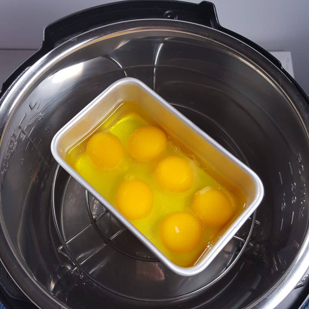 Place Loaf Pan of Eggs in Pressure Cooker