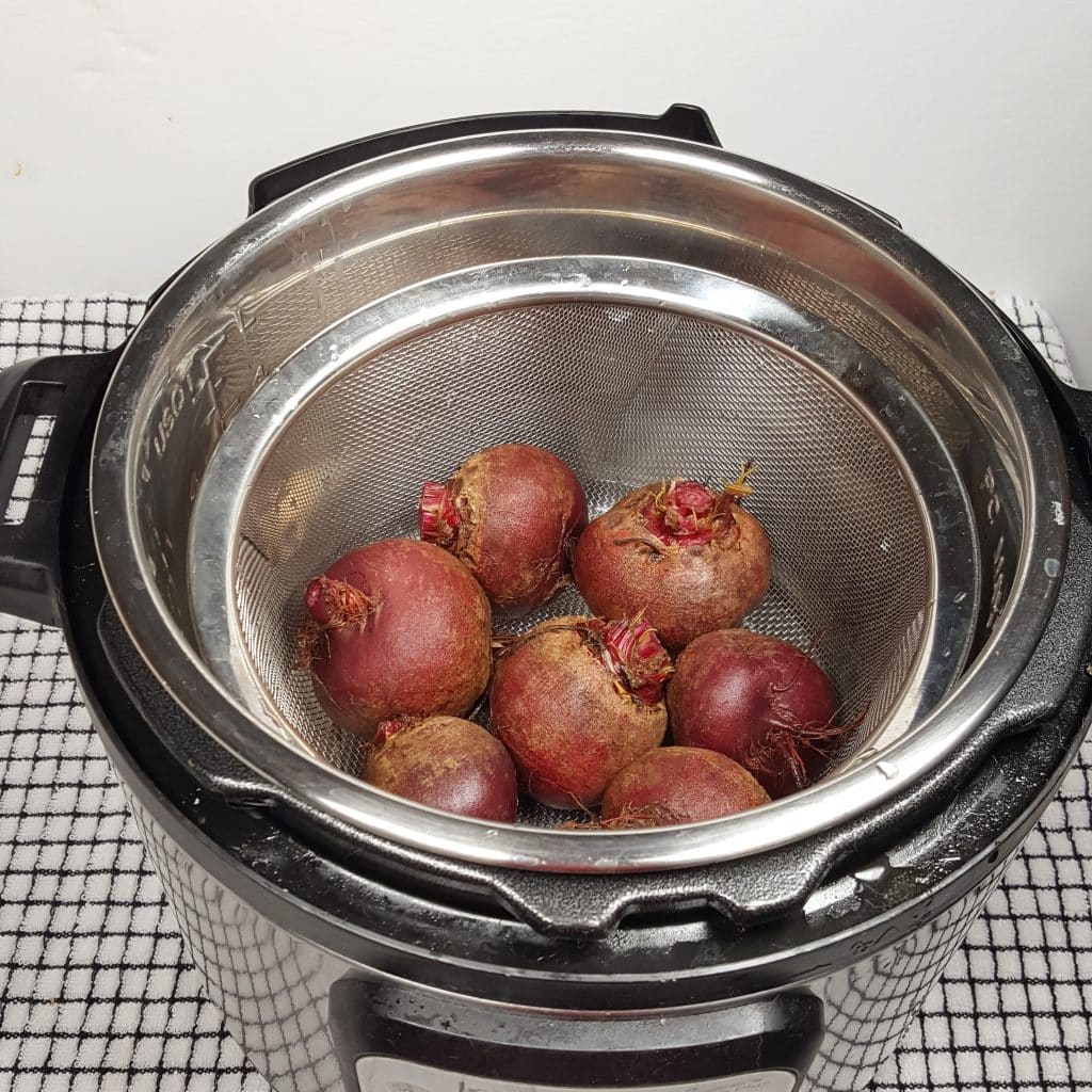 Add Water and the Beets to Pressure Cooker