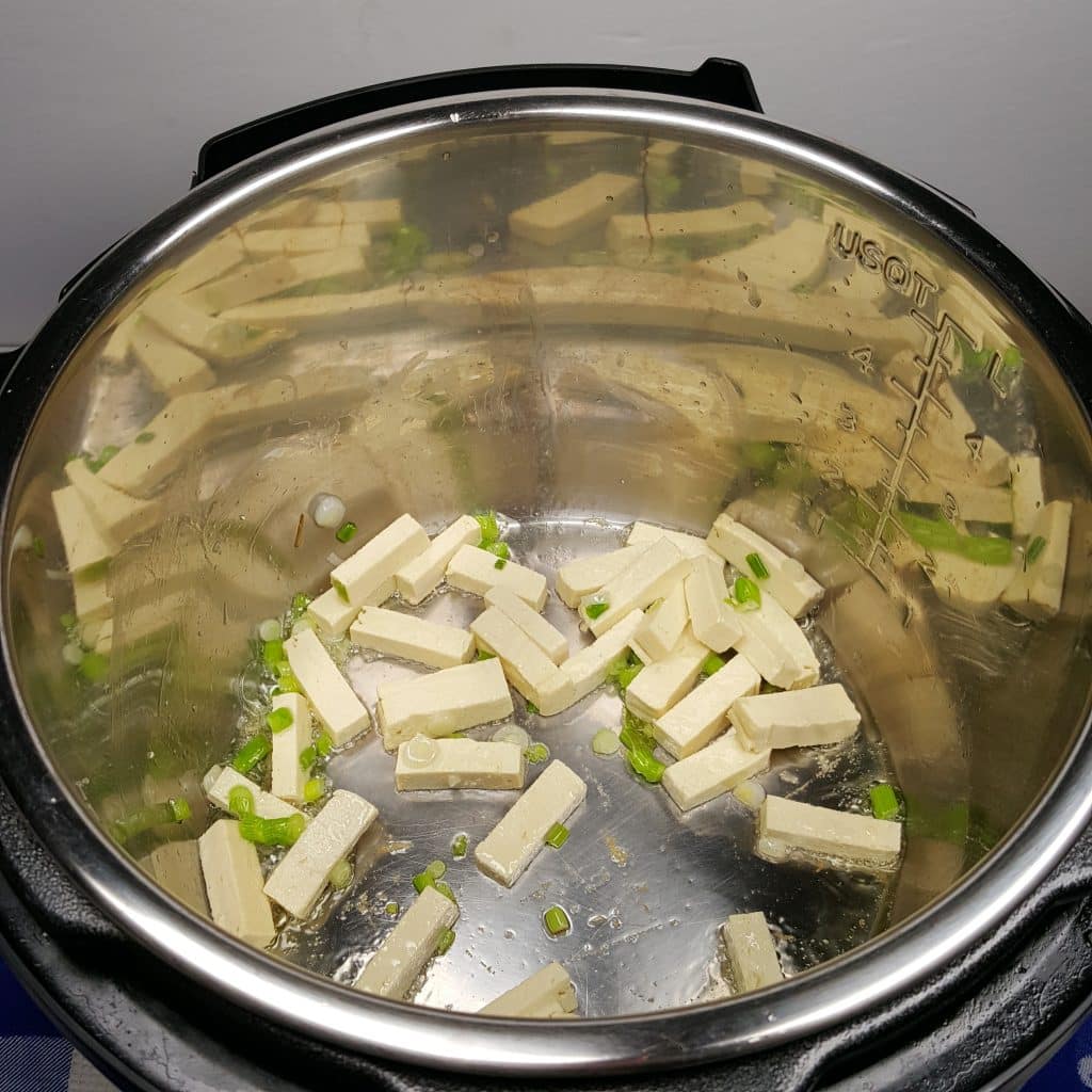 White Parts of Scallions and Tofu Strips