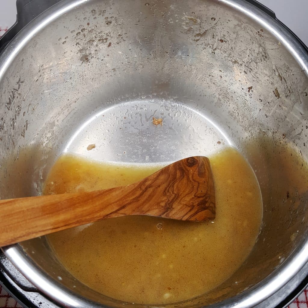 Use a Spatula to Scrape the Bottom of the Pot
