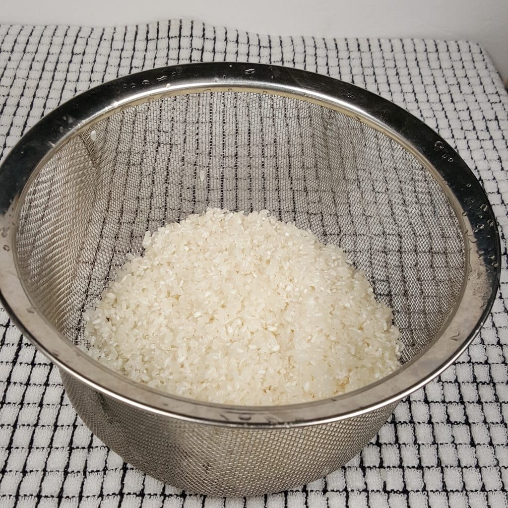 Rinse the Rice under Cool Water to remove starch
