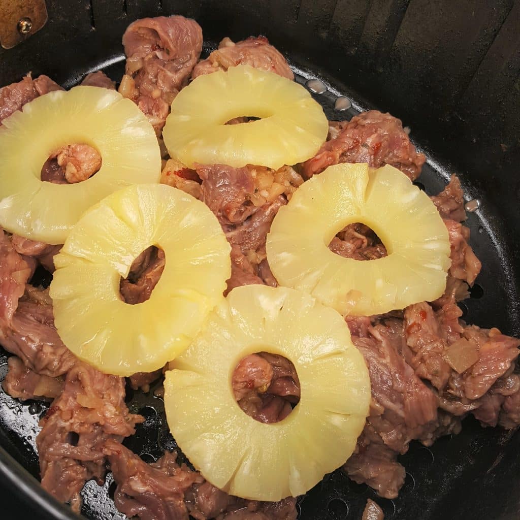 Cover Meat with Pineapple Rings