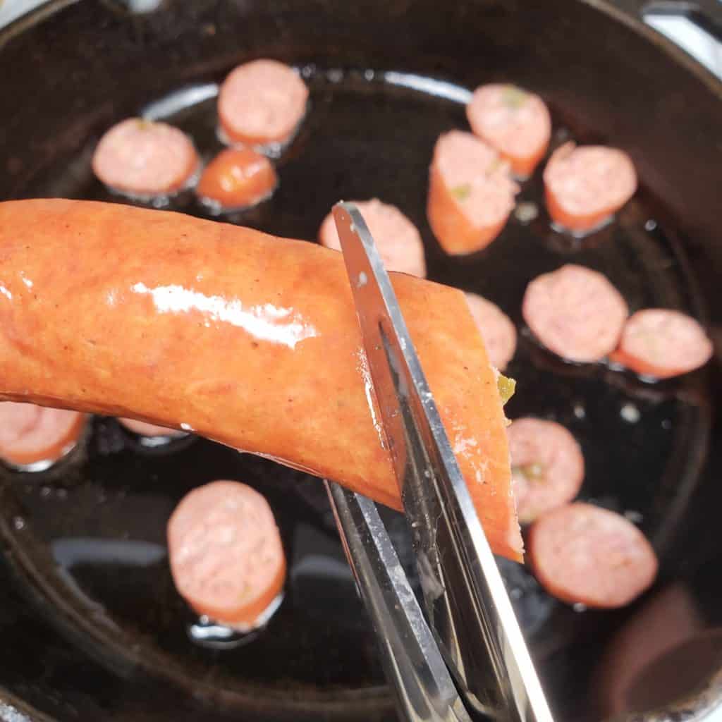 Cut Up Sausages into Skillet