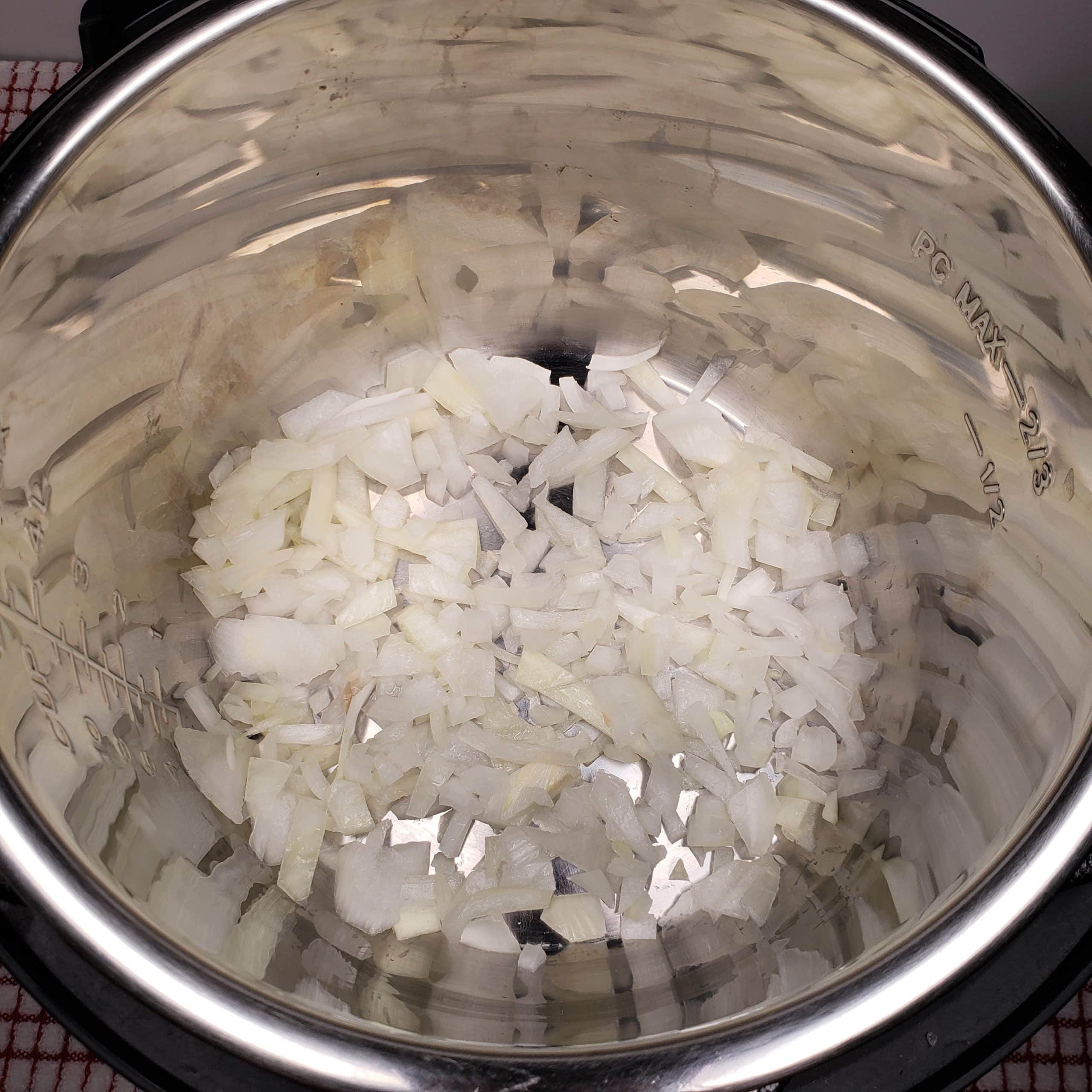 Onions Are Added to Pressure Cooker First