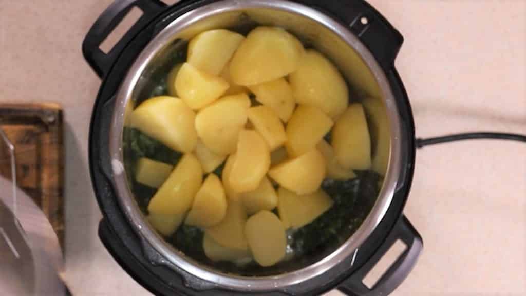 Dump Cooked Potatoes into Cooking Pot with the Kale
