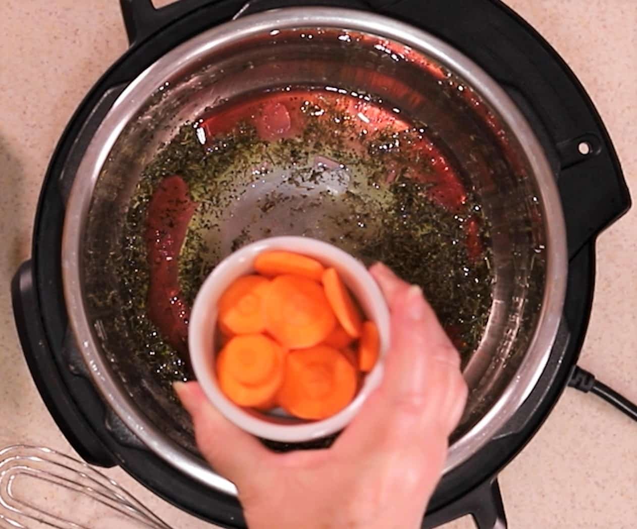 Slice raw carrots going into Instant Pot