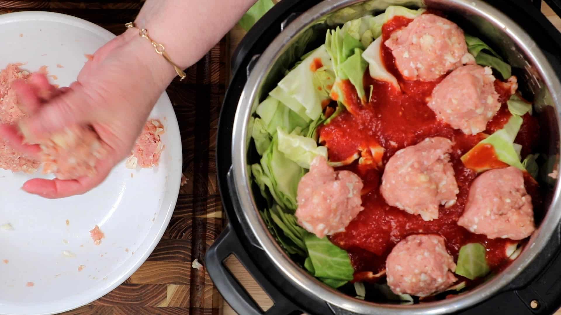 Second Layer of Meatballs Over Cabbage